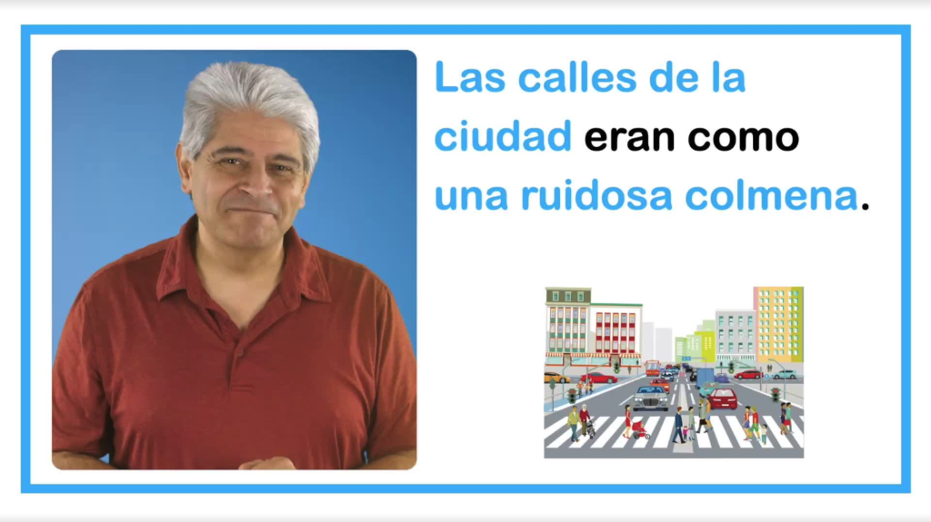 A tutor smiles while going through a Spanish-language sentence demonstrating a simile.